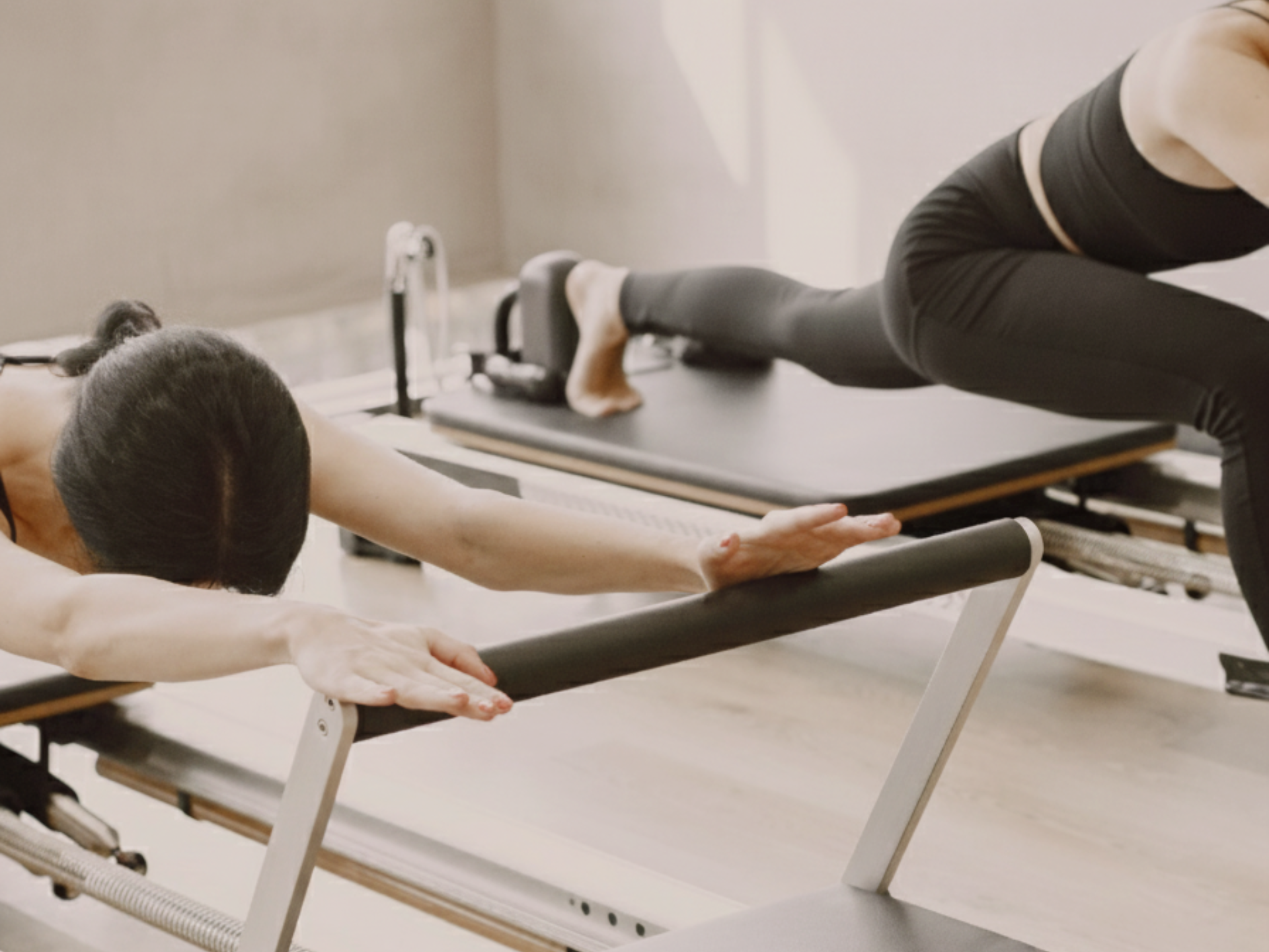 2 women on reformer